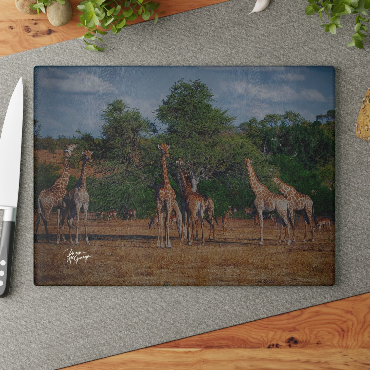 Enjoy Nature Glass Charcuterie Cutting Board with Giraffe Family Design