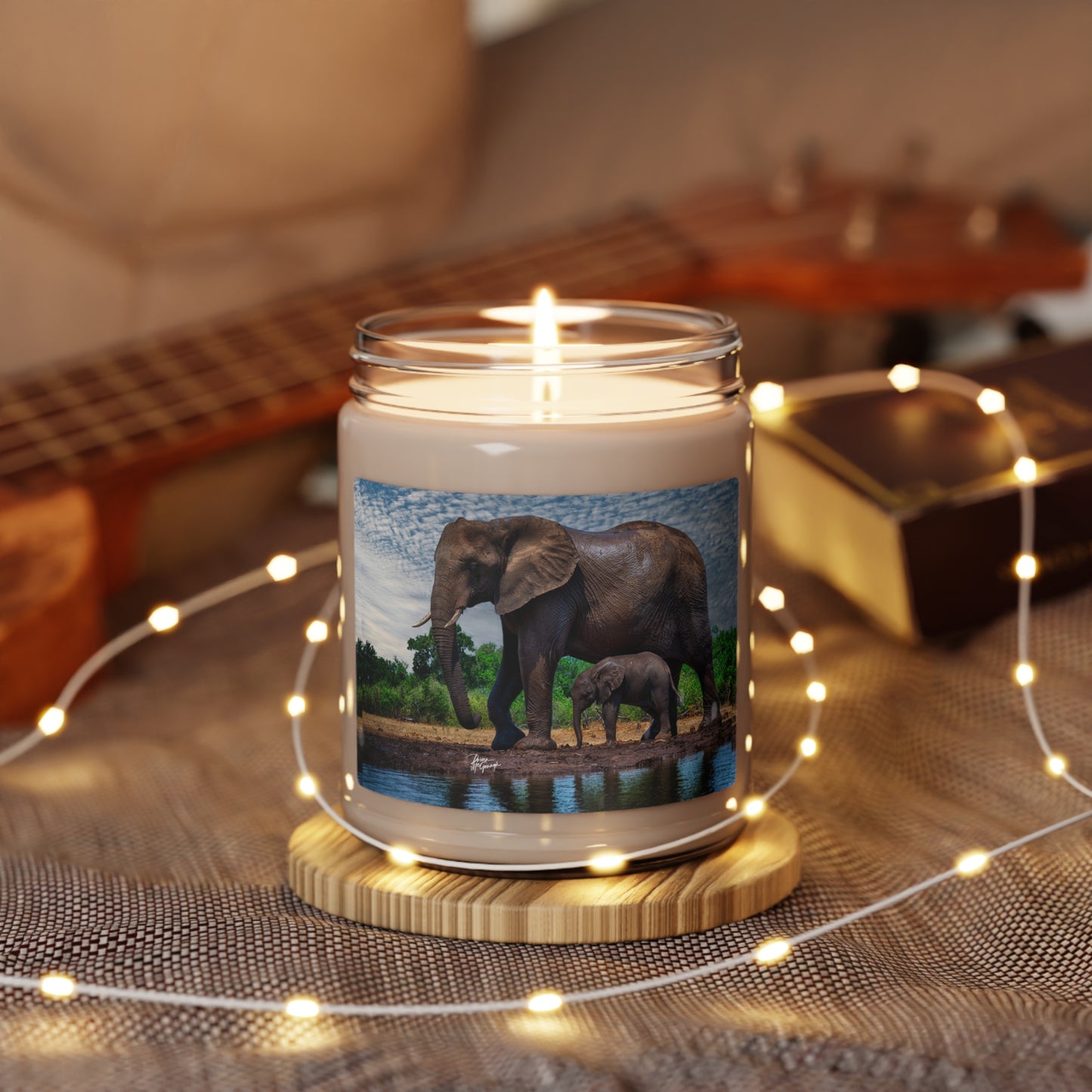 Experience the Pure Essence of Nature with the Spirited Elephant with baby Scented Soy Candle by Enjoy Nature