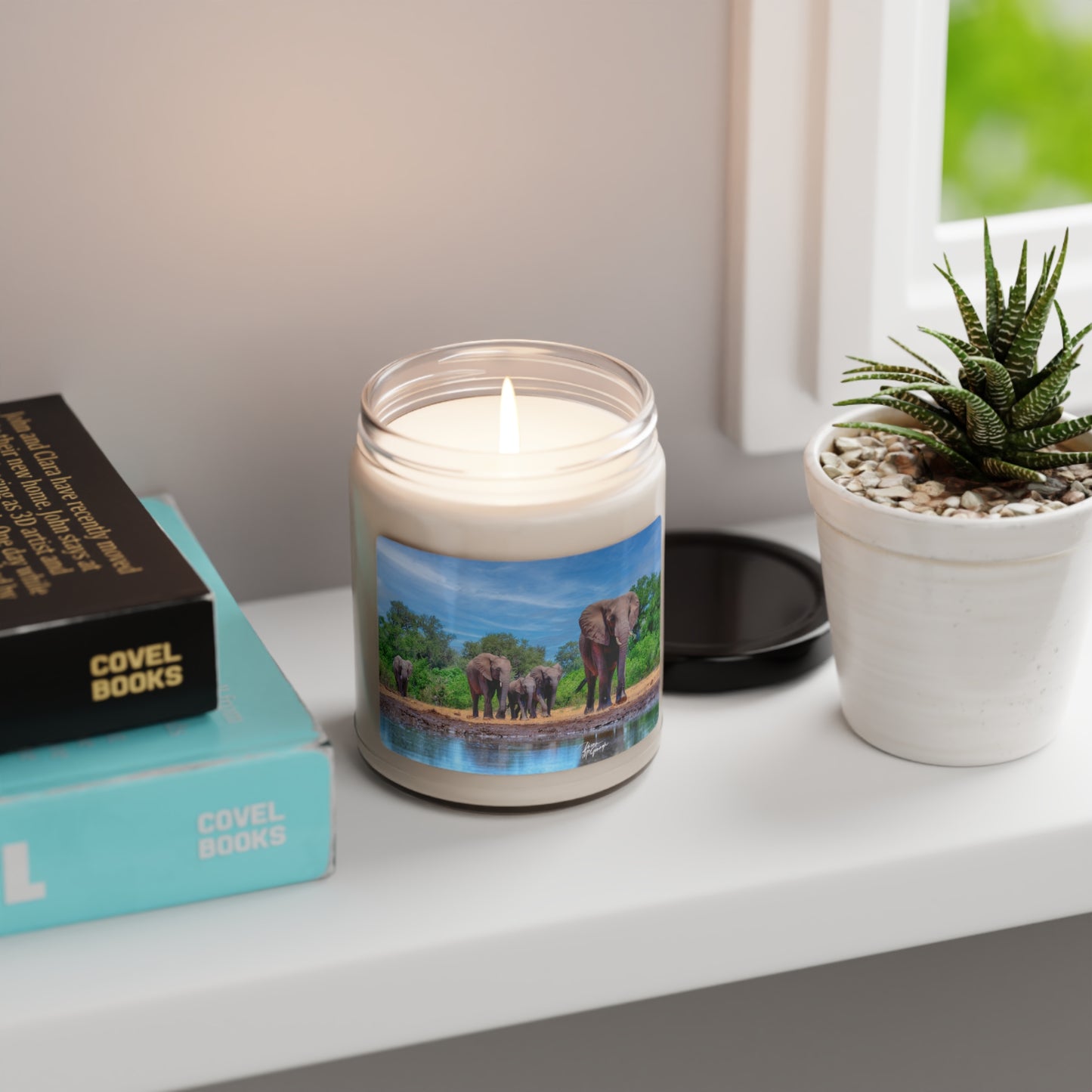 Experience the Pure Essence of Nature with the Elephant Family at Watering Hole Scented Soy Candle by Enjoy Nature