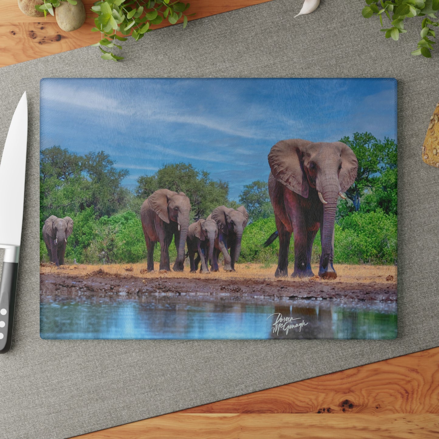 Enjoy Nature Glass Charcuterie Cutting Board with Elephant Family at Watering Hole Design